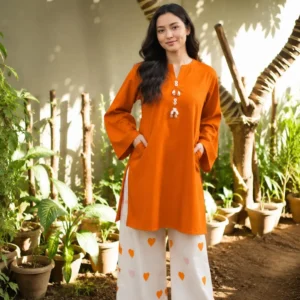 2PC women stitched kurta style ek elegant aur stylish outfit hai jo comfortable fabric mein ready-to-wear design ke saath aata hai. Is kurta par sipi beads (shell beads) ka beautiful handwork kiya gaya hai jo isay aur zyada trendy aur classy look deta hai. Daily wear ya casual gatherings ke liye perfect choice. Highlights Fabric: Cotton Pattern: Plain Neck Type: Round Neck Shirt Pattern: Plain Trouser Fabric: Cotton Trouser Pattern: Plain Available Sizes: Standard Size Number Of Pieces: 2 Pcs Color: Orange Package Includes: 1 x Shirt, 1 x Trouser Shirt Length: 35 Inches Shirt Chest: 21 Inches Shirt Shoulder: 15 Inches Arm Length: 22.5 Inches Trouser Length: 39 Inches Trouser Waist: 30 Inches Trouser Hip: 42 Inches Note: There might be an error of 1-3 cm due to manual measurement, and slight color differences may occur as a result of varying lighting and monitor effects. Product Code: MZ2538200014ZHCN